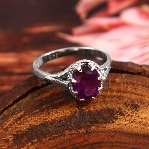 silver ring with purple stone