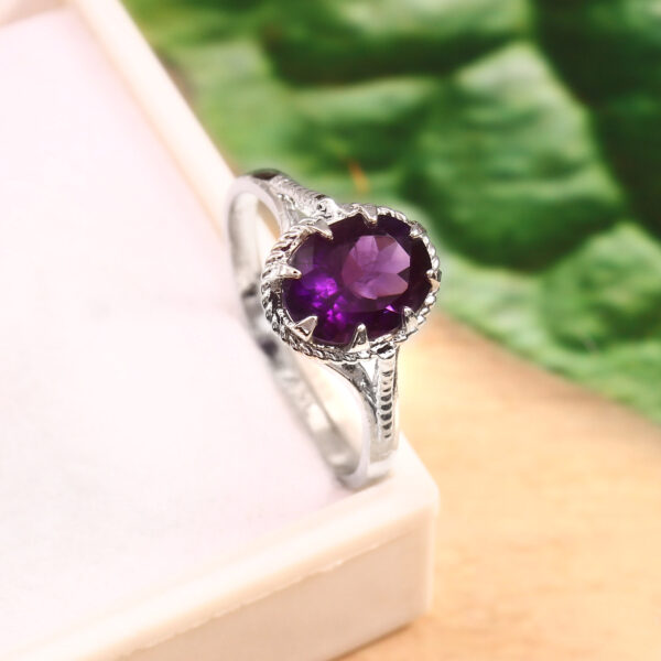 silver ring with purple stone