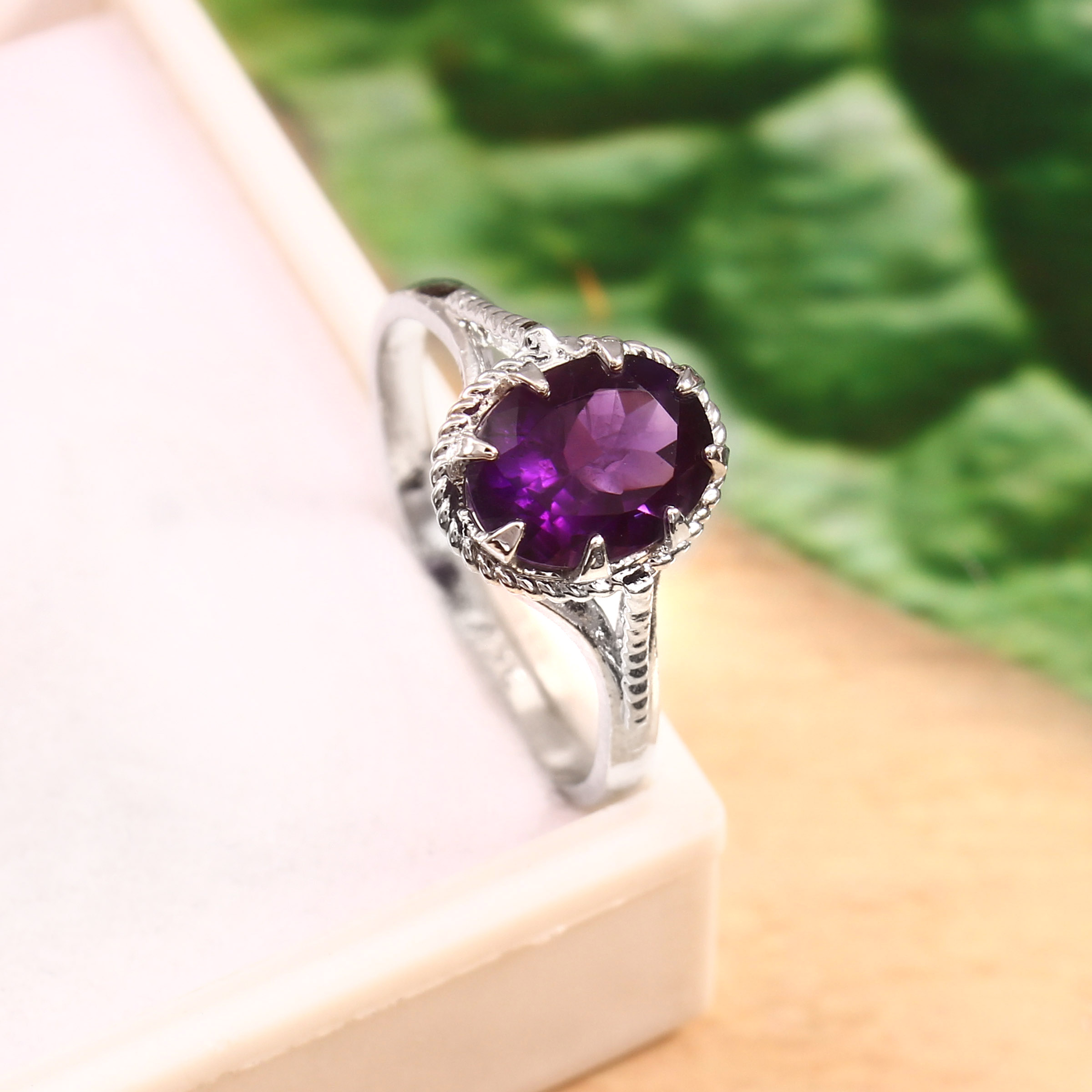 silver ring with purple stone